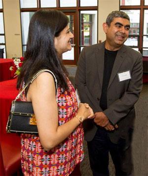 Vandana and Vishal Sikka share a light moment.