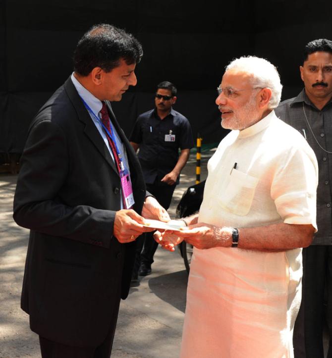 Reserve Bank of India Governor Raghuram Rajan greets Prime Minister Narendra Modi at the RBI headquarters in Mumbai. Photograph: Press Information Bureau