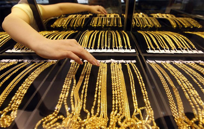 Gold ornaments on display at a jewellery store.