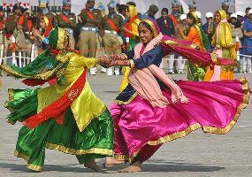 Dancers perform during the Republic Day celebrations in the northern Indian city of Chandigarh January 26, 2011. 