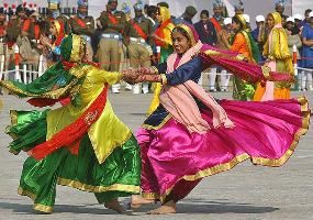 Dancers perform during the Republic Day celebrations in the northern Indian city of Chandigarh January 26, 2011. 