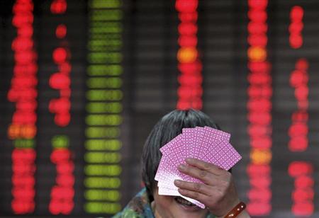 Chinese Shares Surge as State Fund Pledges to Support Markets