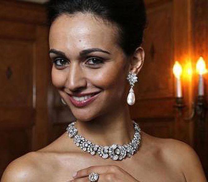 Image: A model wears a diamond necklace by Cartier, estimated at $412,777 - 515,923, in London. Photographs: Stephen Hird/Reuters 