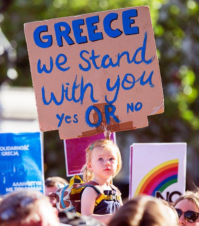 Demonstrators gather to protest against the European Central Bank's handling of Greece's debt repayments, in Trafalgar Square in London, Britain June 29, 2015. 