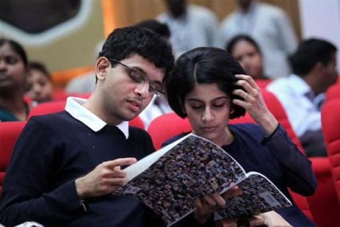 Image: Rohan Murty with his wife, Lakshmi Venu. Photograph: PTI.