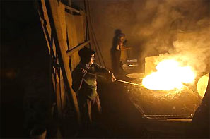 A worker at a steel factory