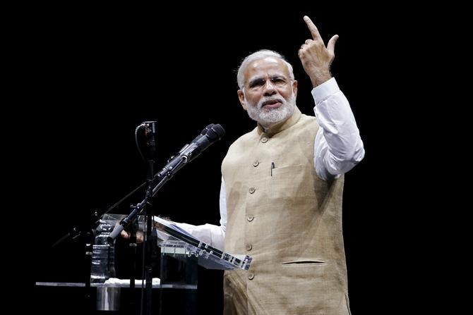 Prime Minister Narendra Modi addresses the crowd during a community reception at SAP Center in San Jose, California