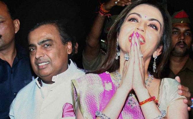 Reliance Industries Chairman Mukesh Ambani with wife Nita Ambani at the company's annual shareholders' meeting in Mumbai.