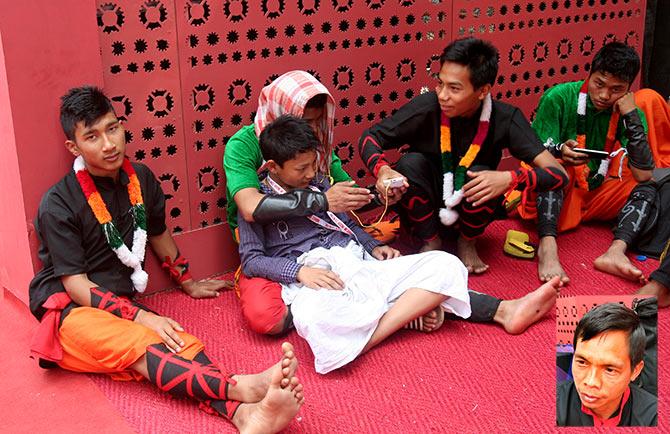 Suresh Singh of Imphal, Manipur (inset) with his group of maryial art experts