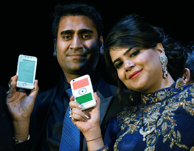 Mohit Goel Director of Ringing Bells, with CEO Dhaarna Goel during the launch of Smartphone-Ringing Bells Freedom 251, in New Delhi