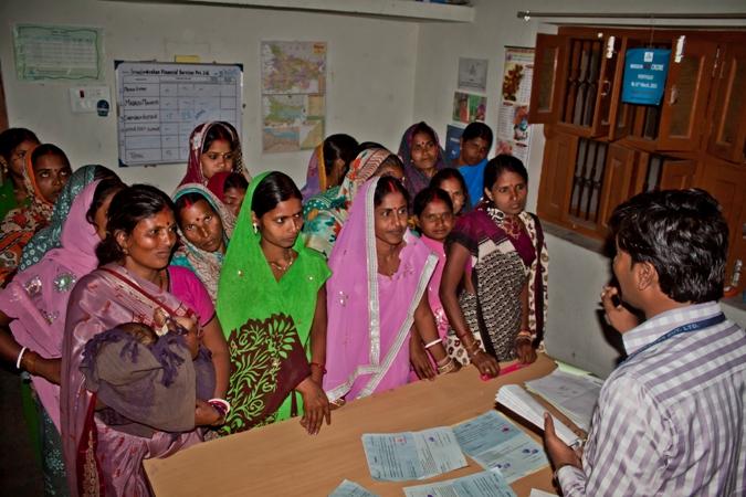 A loan disbursal meeting at an Arohan branch