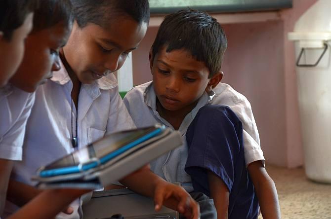 Jyotsnaben Patel's wards enjoy studying simple concepts on their tablets