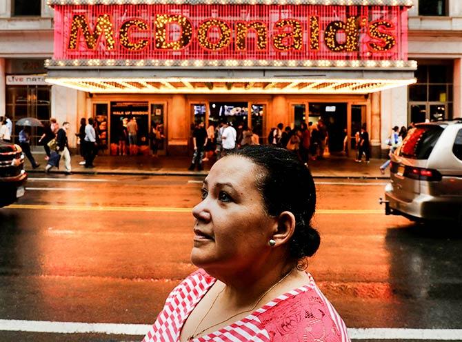 Flavia Cabral, a McDonald's employee, poses for a portrait in New York City, U.S., July 14, 2017. Photo: Lucas Jackson/Reuters