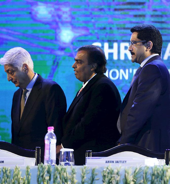 From left, Wipro's Azim Premji, Reliance Industries Limited's Mukesh Ambani, and the Aditya Birla Group's Kumar Mangalam Birla. Photograph: Adnan Abidi/Reuters