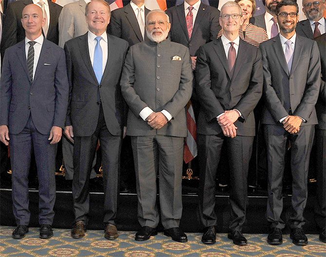 Prime Minister Narendra D Modi is flanked by Jeff Bezos of Amazon, John Chambers of Cisco, Tim Cook of Apple and Sunder Pichai of Google, Washington, DC, June 25, 2017. Photograph: Press Information Bureau