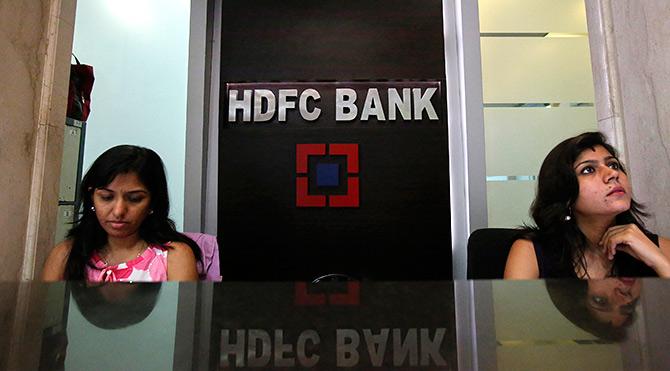 Personal bankers wait for customers at the reception of a HDFC Bank branch, Mumbai, November 17, 2012. Photo: Vivek Prakash/Reuters