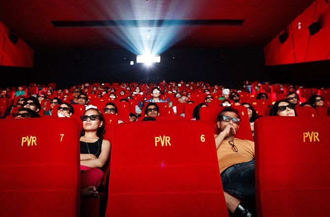 Cinema-goers wearing 3D glasses watch a movie at a PVR Multiplex in Mumbai November 10, 2013. Photo: Danish Siddiqui/Reuters