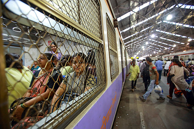 Women are pictured inside a carriage as they wait for the Ladies' Special train to move at Churchgate station, Mumbai. Photograph: Navesh Chitrakar/Reuters.