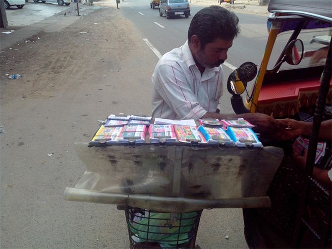Kerala Lottery tickets being sold by a seller on a cycle in Kerala. Photograph: Courtesy Mail2arunjith/Wikimedia Commons.