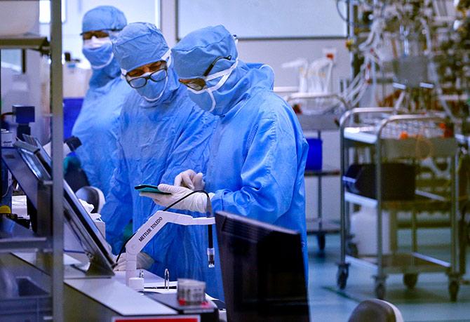 Employees work in the cell culture unit at the French drugmaker's vaccine unit Sanofi Pasteur plant in Neuville-sur-Saone, near Lyon March 14, 2014. Photograph: Robert Pratta/Reuters