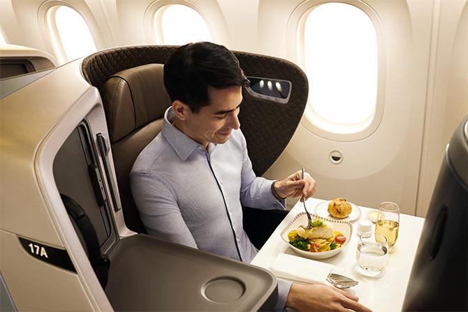 Putting together airline meals. Photograph: Courtesy www.singaporeair.com.