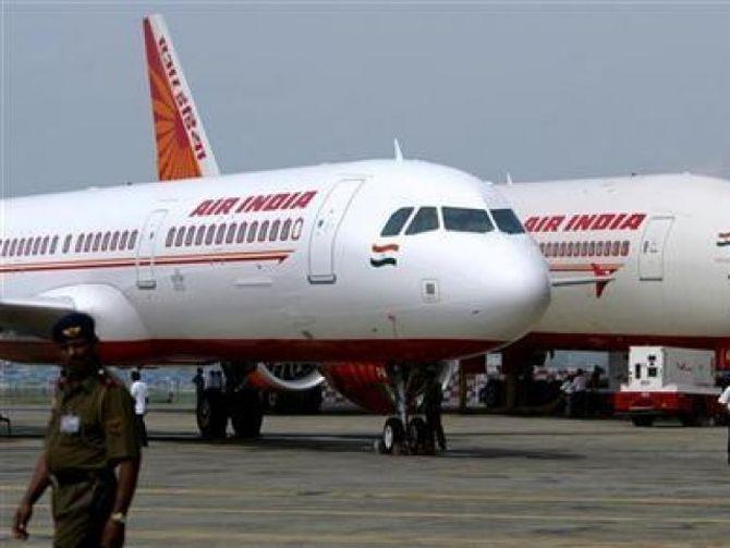 Govt allows NRIs to own 100 pc stake in Air India