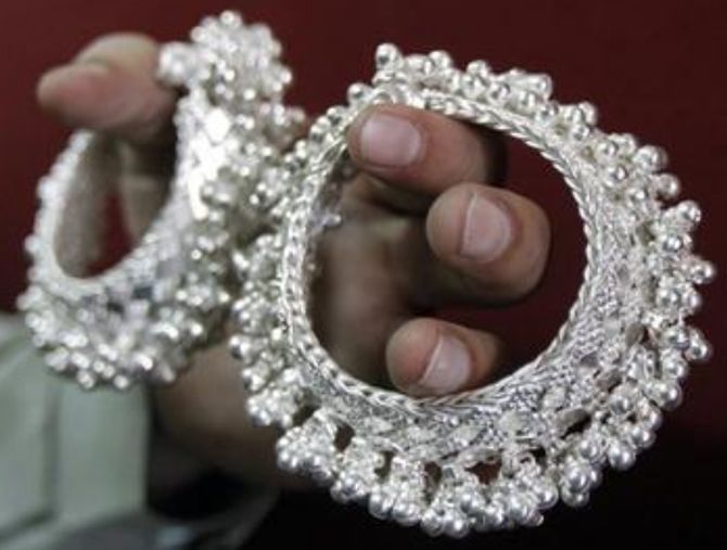 Silver price jumps 8% in two weeks; gold follows suit - Rediff.com