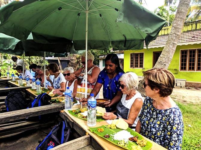 An all-women group of Norwegian tourists tour the Poothotta backwaters on September 18 after the flood waters ebbed. Photograph: Courtesy @KeralaToruism/Twitter.