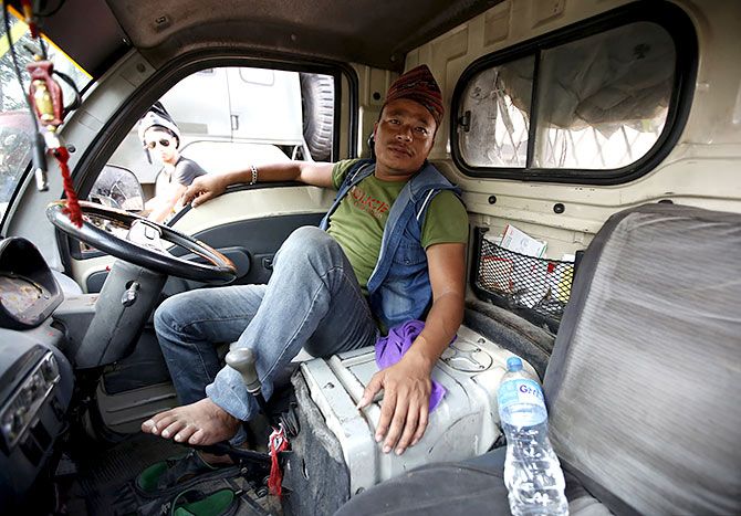 Many Nepali truckers can also be found on Indian roads. Photograph: Navesh Chitrakar/Reuters