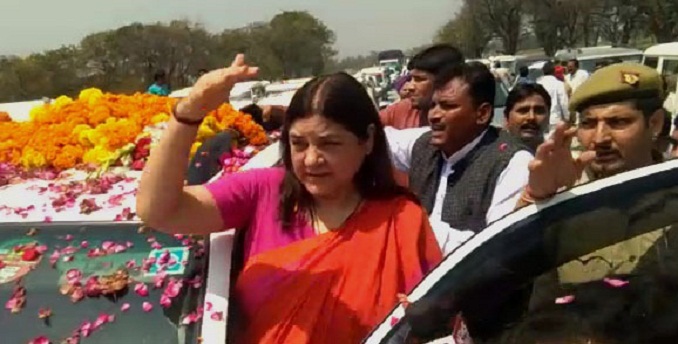 BJP candidate of Sultanpur, Maneka Gandhi, meet her supporters during the road show in Uchgaon. Photograph: ANI Photos