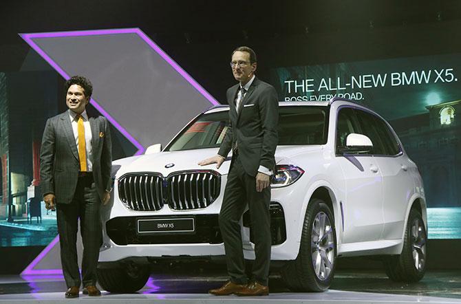 Sachin Tendulkar and Dr. Hans-Christian Baertels, President, BMW Group India with the BMW X5