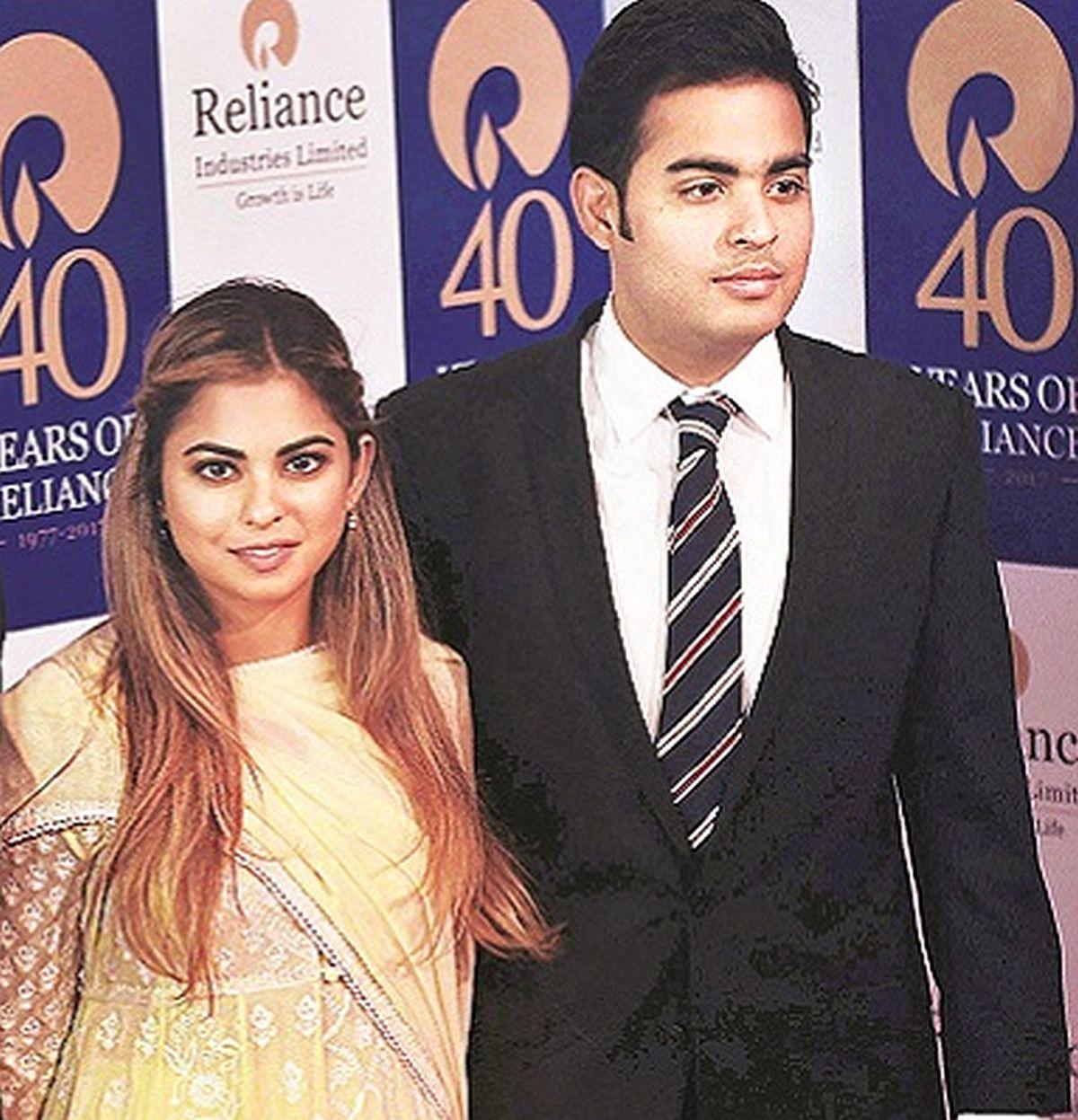 Akash Ambani (right)