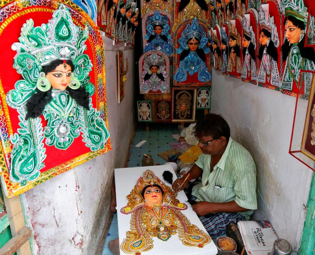 Goddess Durga Idol At Decorated Durga Puja Pandal Shot At Colored Light At  Kolkata West Bengal India Durga Puja Is Biggest Religious Festival Of  Hinduism And Is Now Celebrated Worldwide Stock Photo -