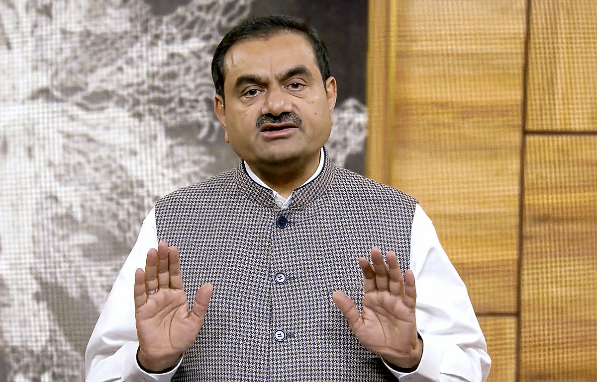 Adani group withdraws from M&As, to prepay debt