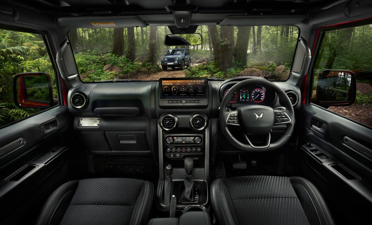 The all black dashboard of the new 2025 Mahindra Thar