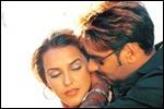 Neha Dhupia and Ajay Devgan in Qayamat