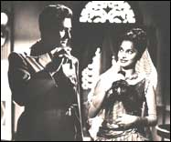 With Dev Anand in C.I.D.