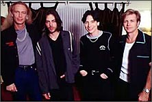 Eric Martin (third from left) with former band mates Mr Big.