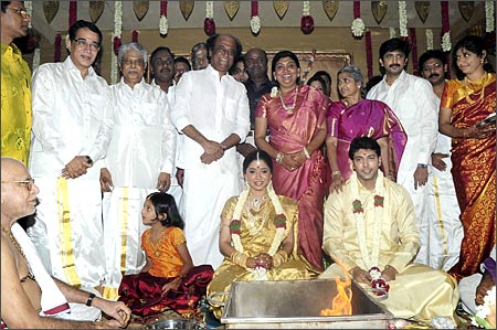 Tamil superstar Rajnikanth (behind the bride) was also spotted