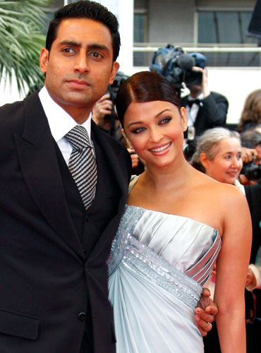 Abhishek and Aishwarya Rai Bachchan pose on the red carpet in Cannes