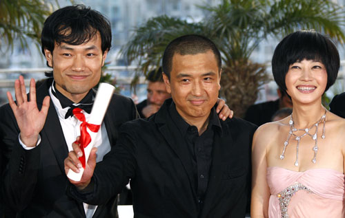 Chinese director Lou Ye (centre) poses with cast members Zhuo Tan (right) and Wei Wu