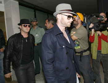 Boyzone members Mikey Graham (left) and Ronan Keating arrive at Son San Joan airport on Sunday