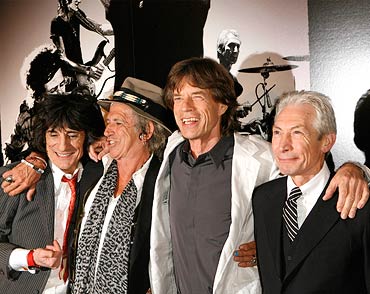 Rolling Stones band members Keith Richards (2nd L), Mick Jagger (2nd R), Ronnie Wood (L), and Charlie Watts