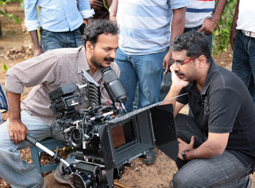 Cinematographer Nirav Shah and director C S Amudhan discuss a scene