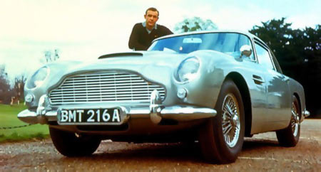 Sean Connery poses with the Aston Martin from Goldfinger