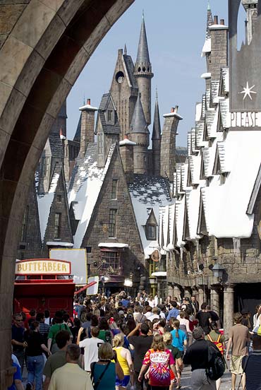 Guests enter The Wizarding World of Harry Potter theme park