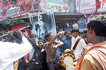 Fans dance to traditional South Indian music