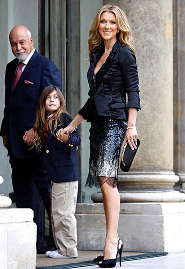 Celine Dion arrives with her husband Rene Angelil and son Rene-Charles