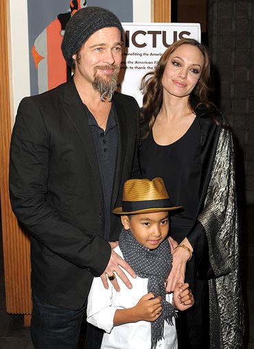Maddox Jolie Pitt with Brad Pitt and Angelina Jolie