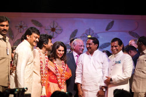 The couple with their families and AP Chief Minister Kiran Kumar Reddy (second from right)